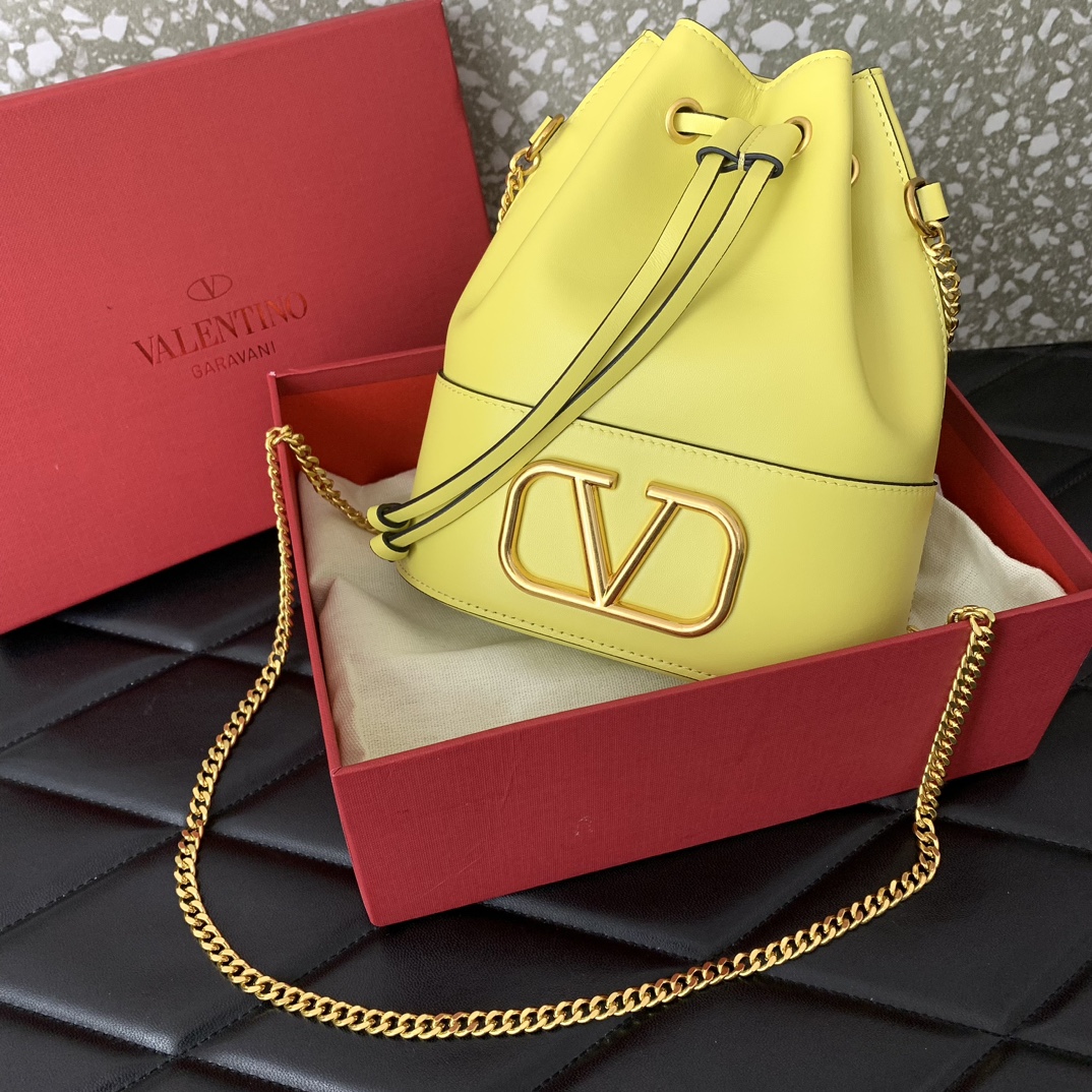 Valentino Garavani VLogo Signature Mini Bucket Bag in Yellow Nappa Leather 